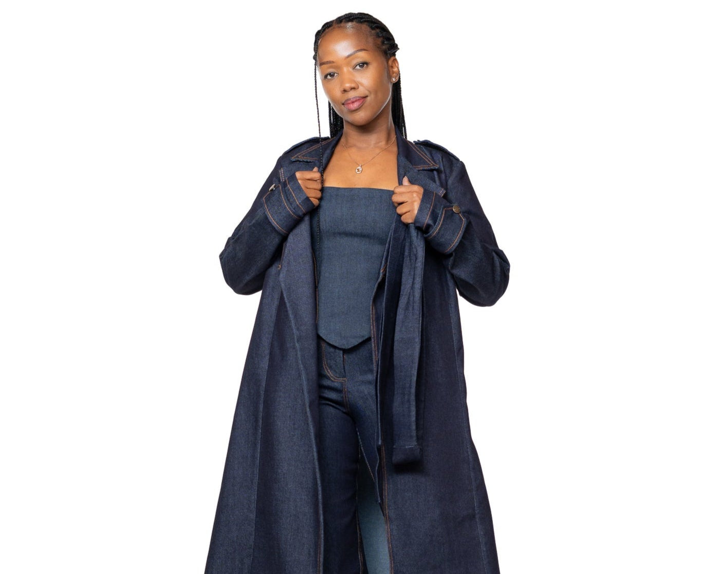 Women’s dark wash denim trench coat with belted waist and longline cut, stylish outerwear fashion Kenya.