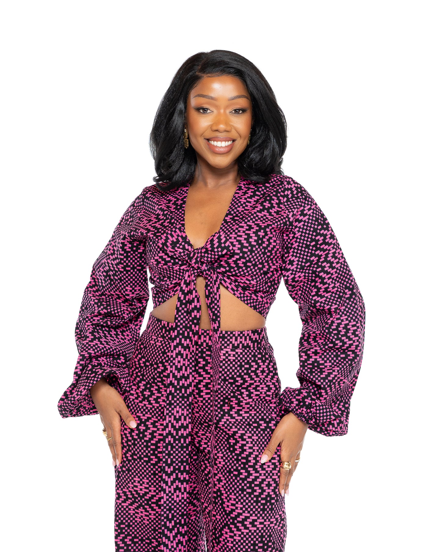 Pink and black Ankara African print wide-leg pants with high waist, bold wax print fabric, women’s stylish trousers Kenya.