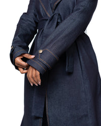 Women’s dark wash denim trench coat with belted waist and longline cut, stylish outerwear fashion Kenya.
