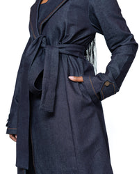Women’s dark wash denim trench coat with belted waist and longline cut, stylish outerwear fashion Kenya.