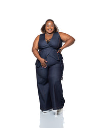 Denim sleeveless wrap top with dark wash finish, deep V-neckline, and side tie, women’s stylish denim blouse Kenya.