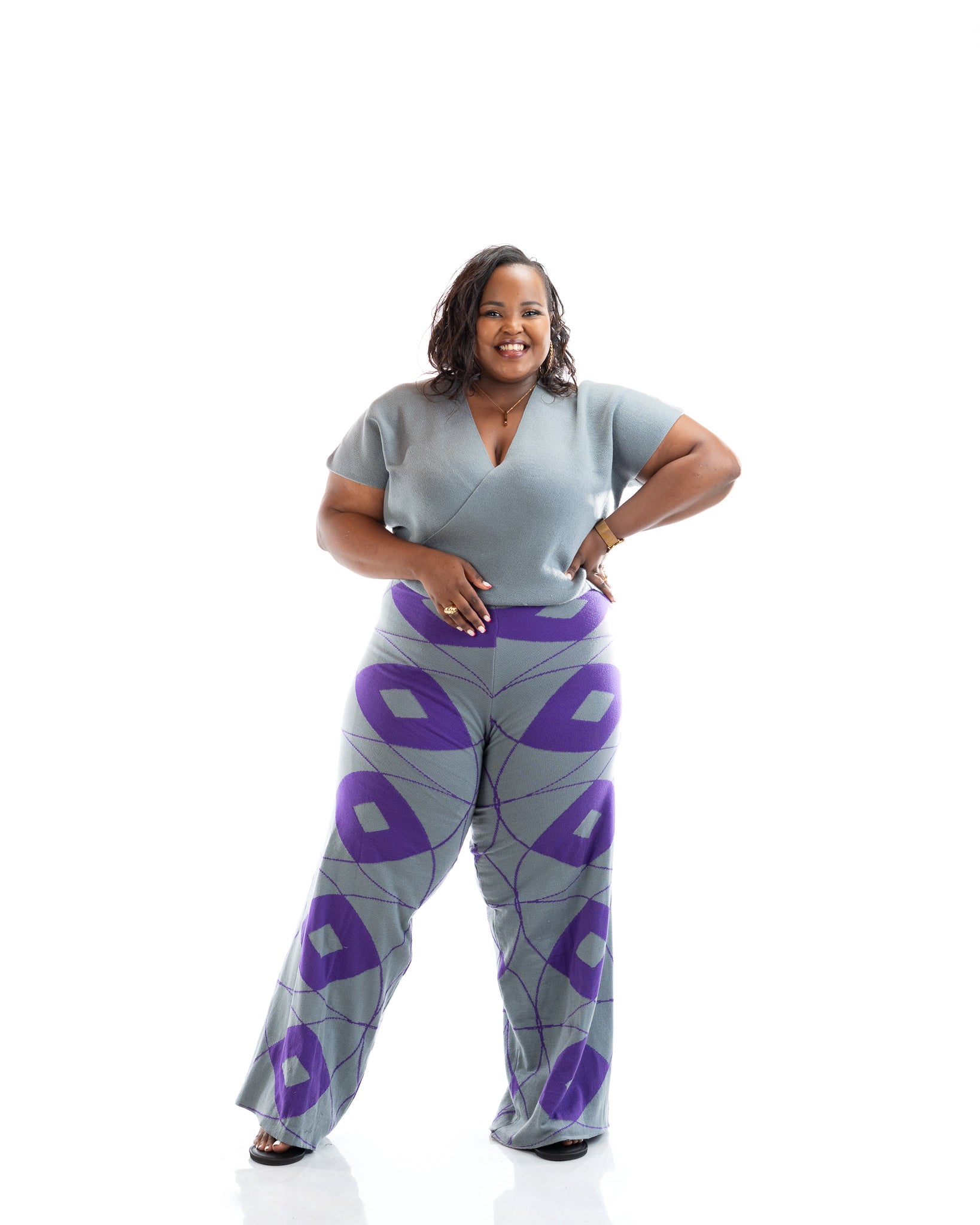 Grey and purple wide-leg knit pants made from 100% acrylic yarn, patterned women’s trousers for plus size and curvy fashion in Kenya.