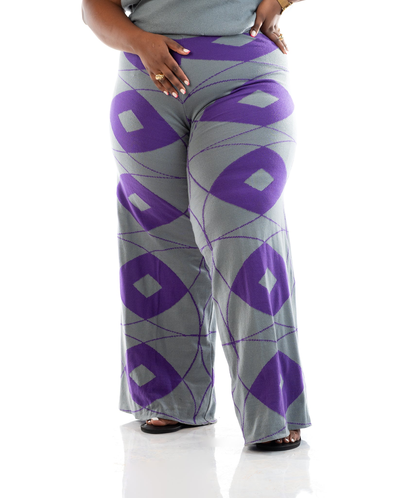 Grey and purple wide-leg knit pants made from 100% acrylic yarn, patterned women’s trousers for plus size and curvy fashion in Kenya.